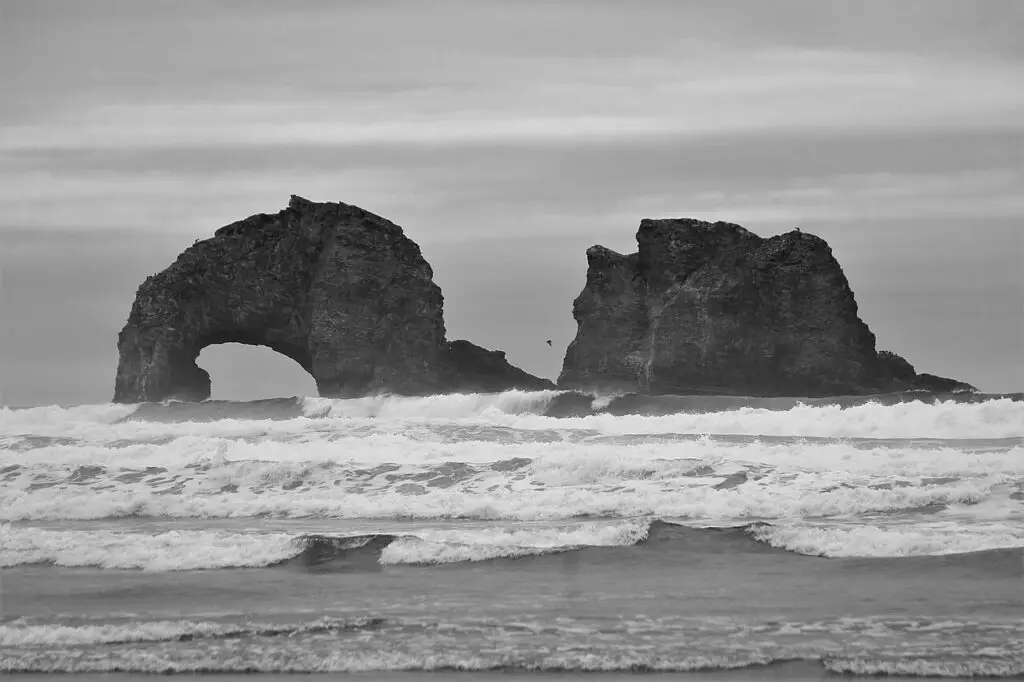 Twin Rocks rising from the Pacific Ocean at Rockaway Beach, Oregon